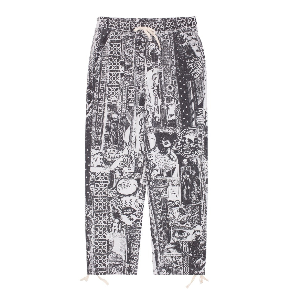 Shorts med sort/hvid collage-print, løst snit og knytebånd ved anklen