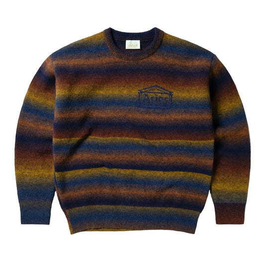 Aries striktrøje i mohair-look med gradient-striber i navy, rust og sennep og broderet Temple-logo