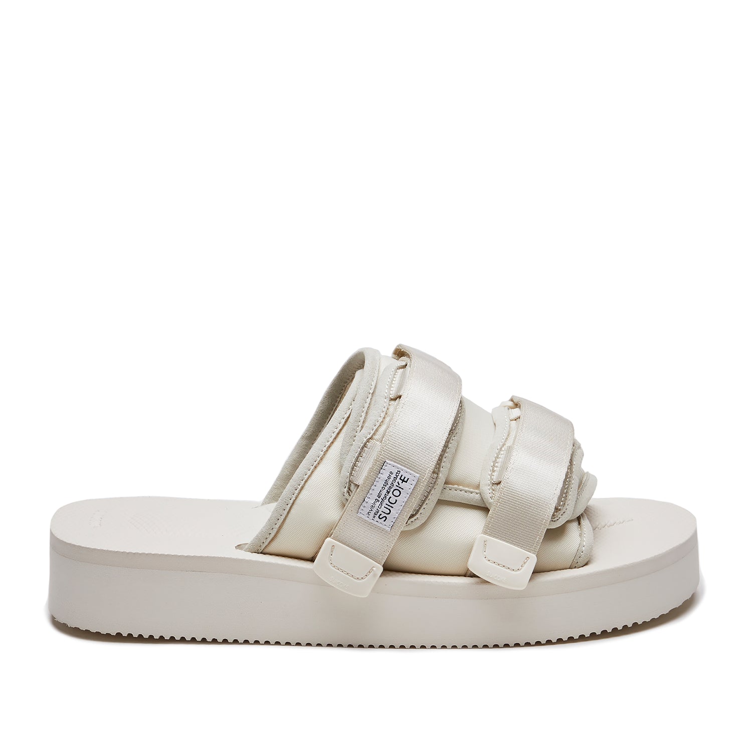 Off-white slide med brede velcrostropper og tyk EVA-sål med let profil