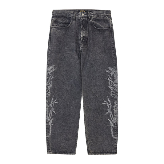 Aries baggy denim i acid-vasket grå med laser-printet knoglesmotiv langs benene
