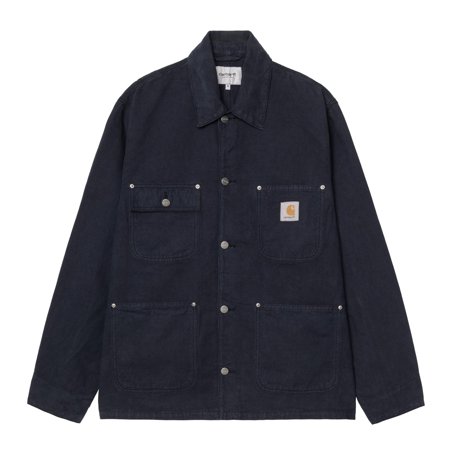 Carhartt WIP chore coat i mørkeblå canvas med fire patchlommer og klassisk arbejdsjakke-krave